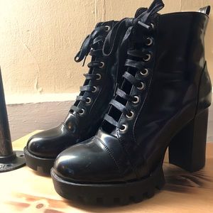 Black, pleather boots. Very well made.
